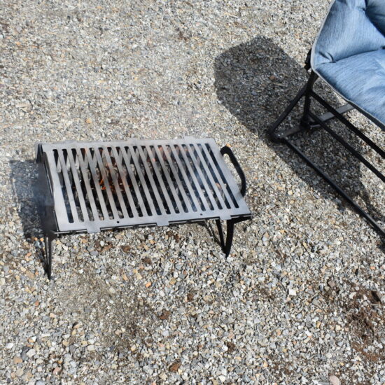 Portable Grill for outdoor bar-b-ques on the go. wood or briquette fired.