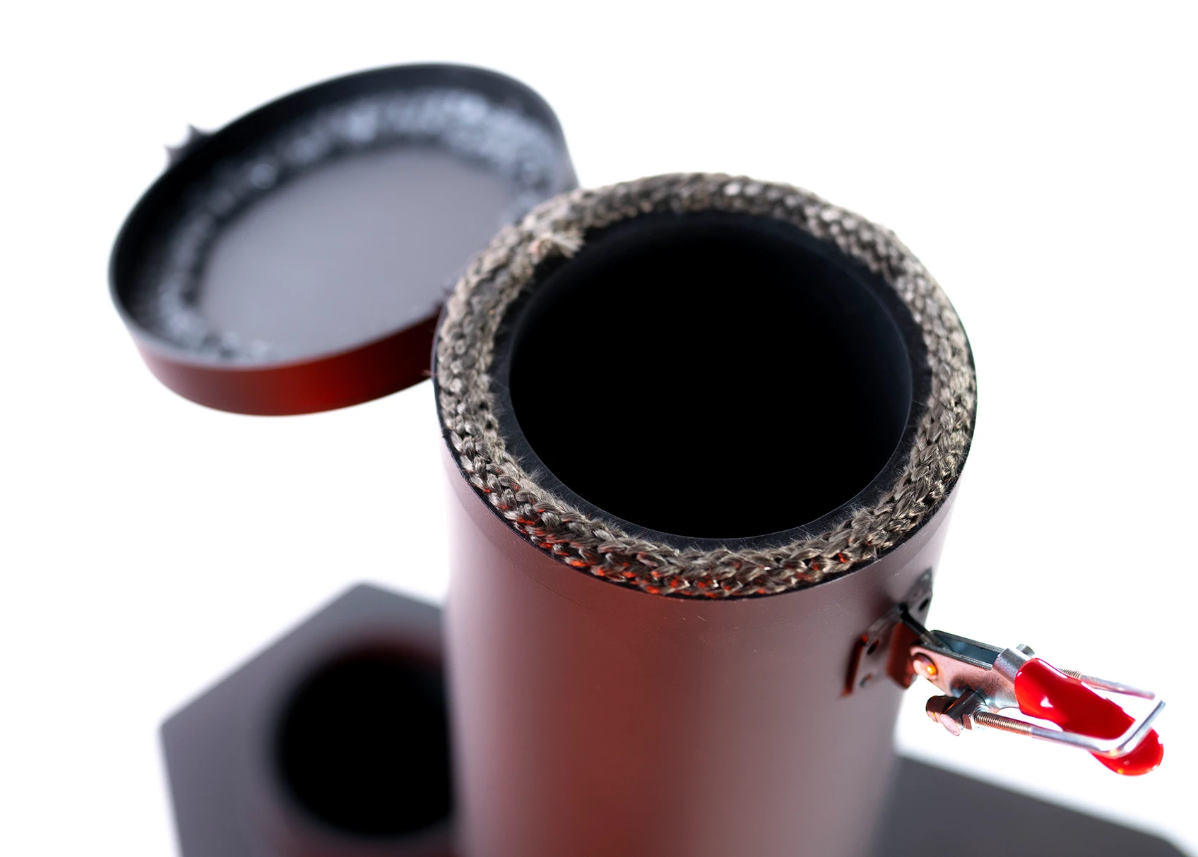 top down view of a compressed log gravity feed tube for a stove