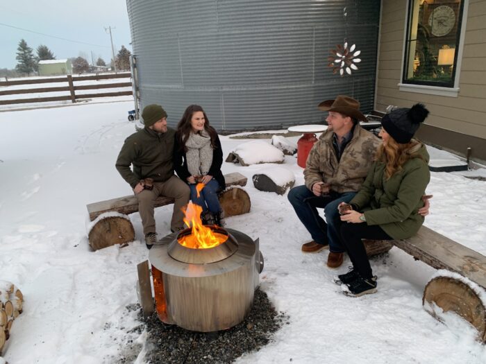 group of people by the fire